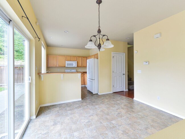 Building Photo - Charming 3-Bedroom Home with Spacious Back...