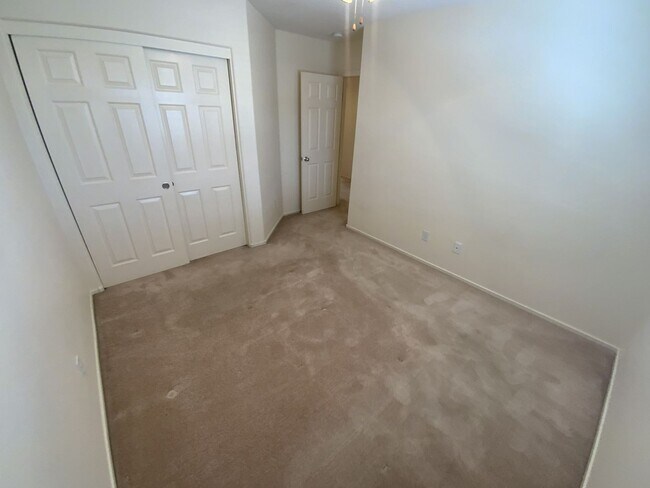 Building Photo - 4 bedrooms and 2.5 bathrooms 2-story home located in Henderson, NV!