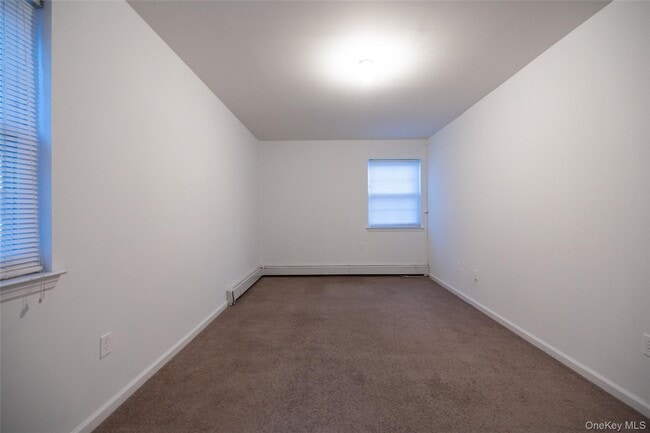 Building Photo - 62-21 Almeda Ave