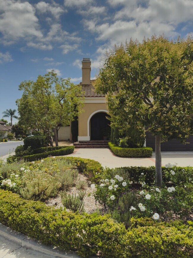 Building Photo - Elegant Mediterranean Living with Private Pergola Garden & Resort Amenities
