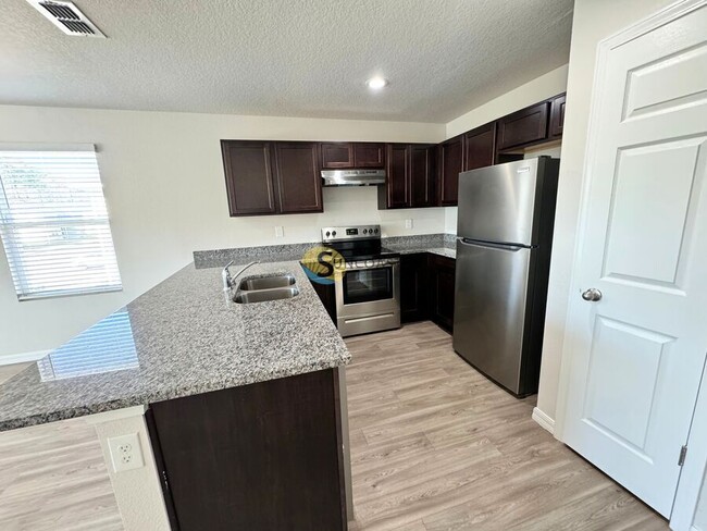 Building Photo - 7637 Mailes Ct