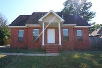 Building Photo - 4 Bedroom Home Within Minutes from NEA Hospital