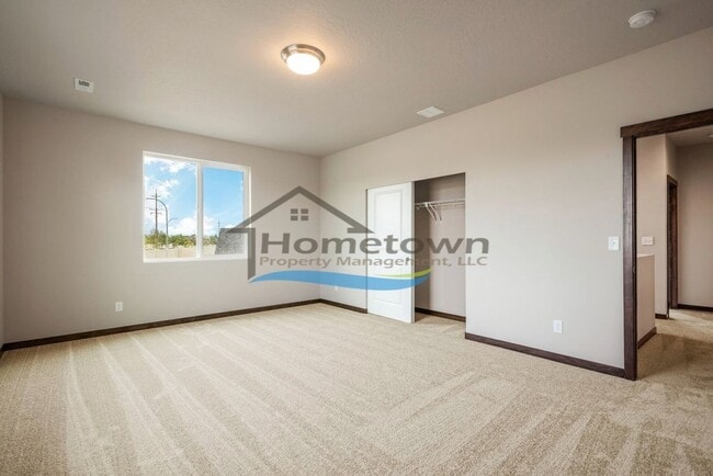 Building Photo - Woodbridge South Home with 4 Bedrooms and 3 Bathrooms in Post Falls build in 2021!