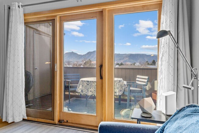 Building Photo - Flatiron View Retreat with Vaulted Ceilings & Private Balcony