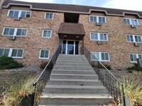 Building Photo - Newly Updated 1 Br/1 Ba Condo w/Hdwd Flrs, SS Appl, AC, Off-St Parking in Uptown Mpls near Wedge ...