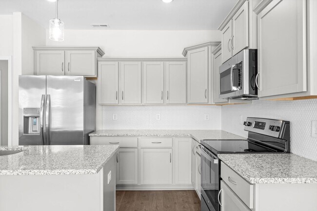 Building Photo - Pet Friendly Three Bedroom with Bonus!