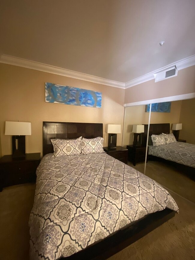 Building Photo - Fully furnished 2 bedroom unit in 24/7 guard gated community