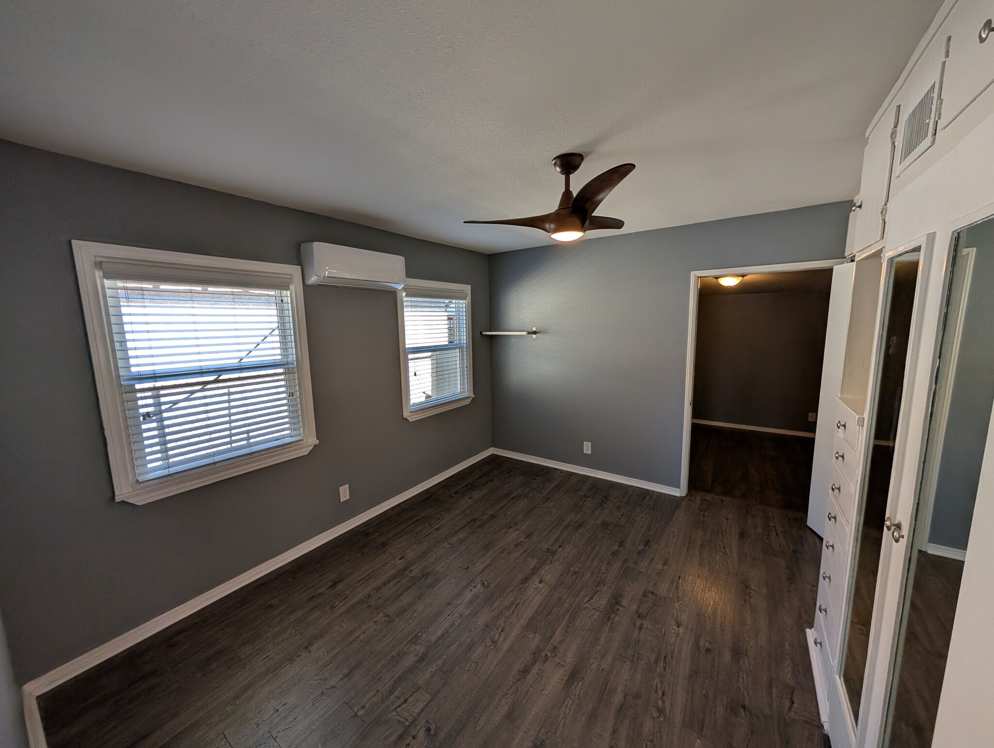 Primary bedroom with door leading to the second bedroom - 4828 Sawtelle Blvd