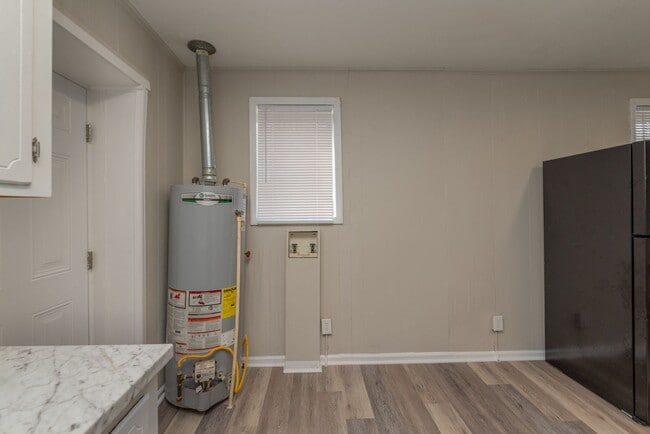 Building Photo - Brick home with a fenced-in yard! Section 8 accepted