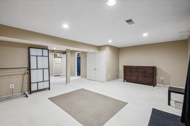 Building Photo - Modern Brick End-Unit Townhome with Stunning Upgrades and Serene Wooded Views