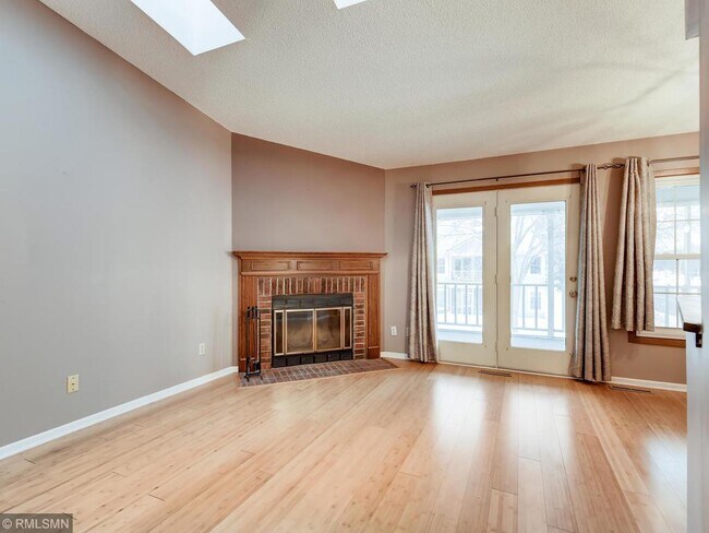 Woodburning fireplace in living room. - 7301 W 109th St