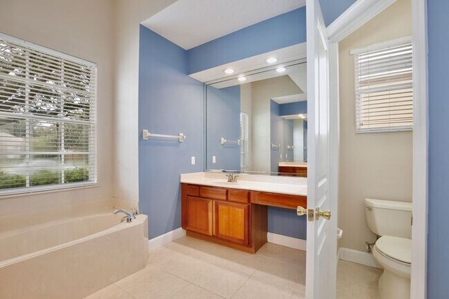 Building Photo - Stunning 4/3 Pool Home with a Bonus Room a...