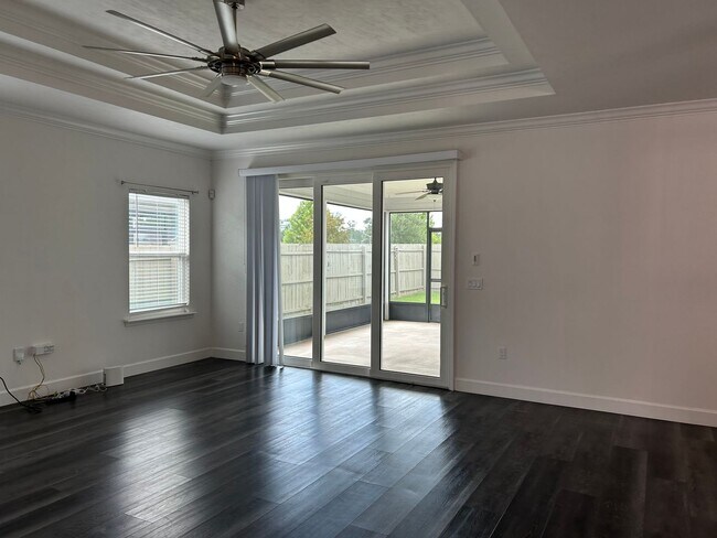 Building Photo - Immaculate 3/2 with Yard, Garage, and Pet ...