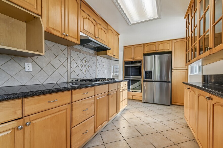 With refrigerator, double wall ovens, stove, dishwasher - 6003 N Muscatel Ave