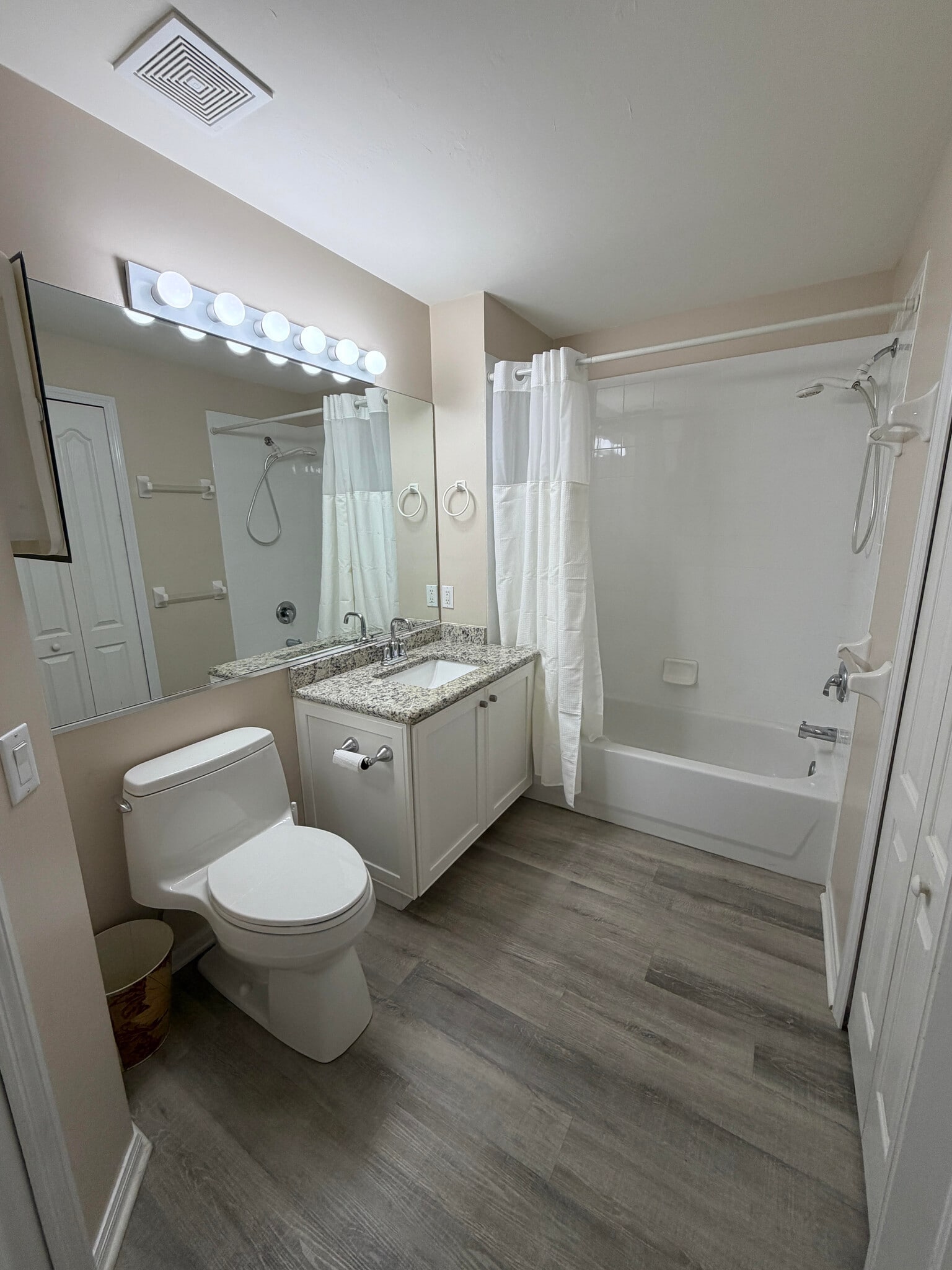 Guest bath, remodeled cabinets, granite, sinks. - 9231 Spring Run Blvd