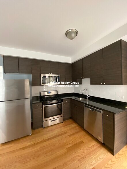 Building Photo - 1645 W Pratt Blvd