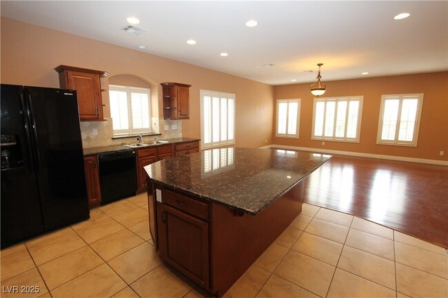 Building Photo - 9528 Victory Garden Ave