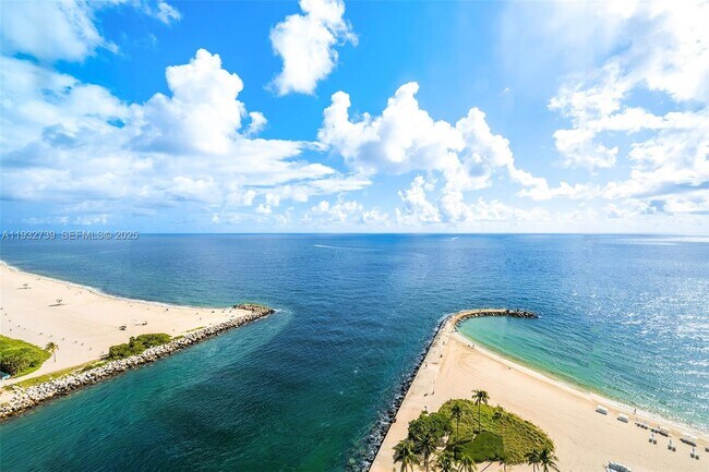 Building Photo - 10295 Collins Ave