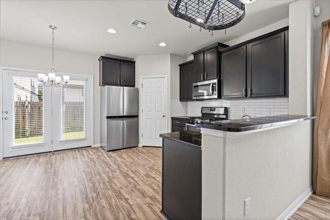 Building Photo - 9703 Sunny Swan Ct