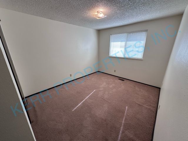 Building Photo - FREE RENT! Charming 2-Bedroom Multiplex in...