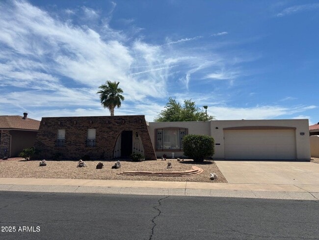 Building Photo - 9719 W Rolling Hills Dr