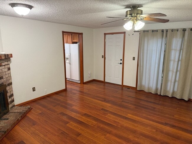 Building Photo - Beautiful 3 Bedroom Ranch Style House with 2 Car Garage, Fences Yard, Fireplace, Shed, Workshop &...