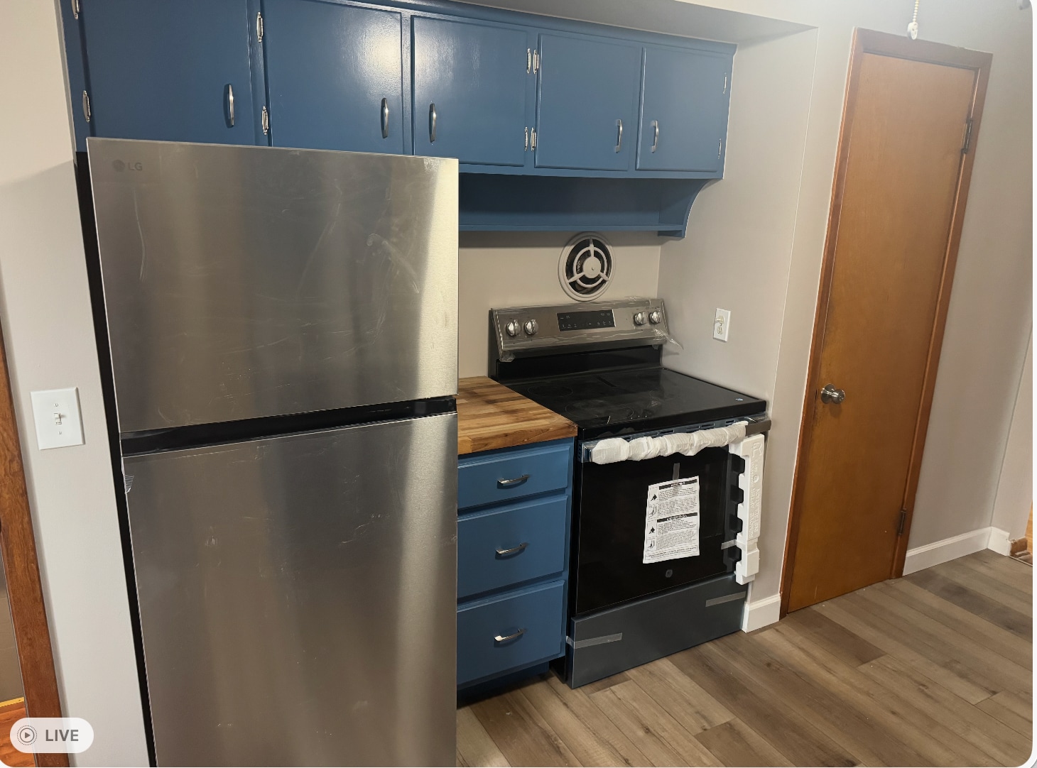New Appliances and cutting board unit between stove and fridge. Cabinets freshly painted. - 3340 W 210th St