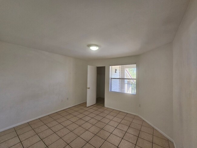 Building Photo - NICE!  2 BED / 2 BATH CONDO (ACROSS FROM C...