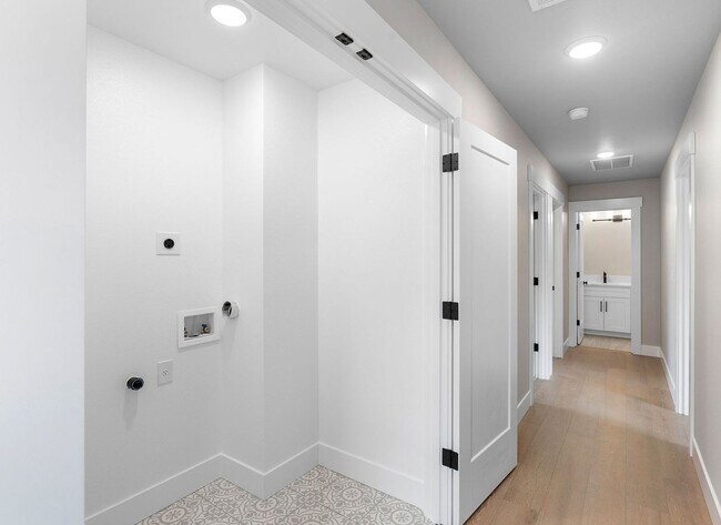 Building Photo - Beautiful New Construction 4-Bedroom Home with a Main-Level Bedroom, Designer Finishes, Attached ...
