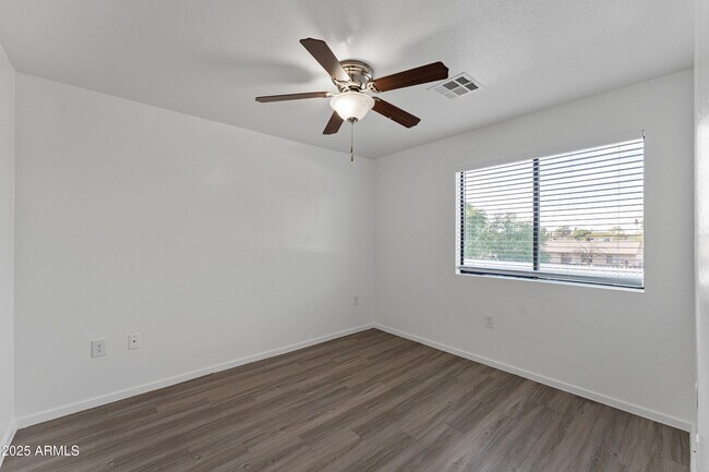Building Photo - 3065 N 67th Ave