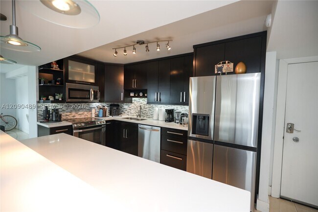 Building Photo - 7135 Collins Ave