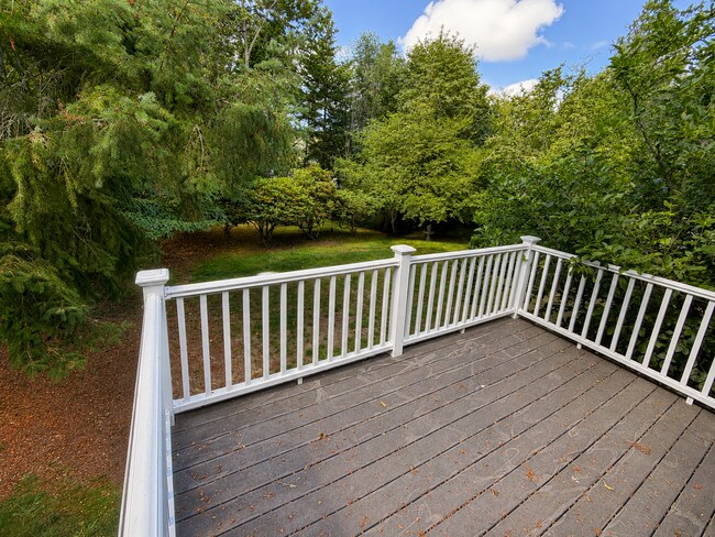 Building Photo - Beautiful Split-Level Home with Fireplace, Deck, Garage, and EV Charger