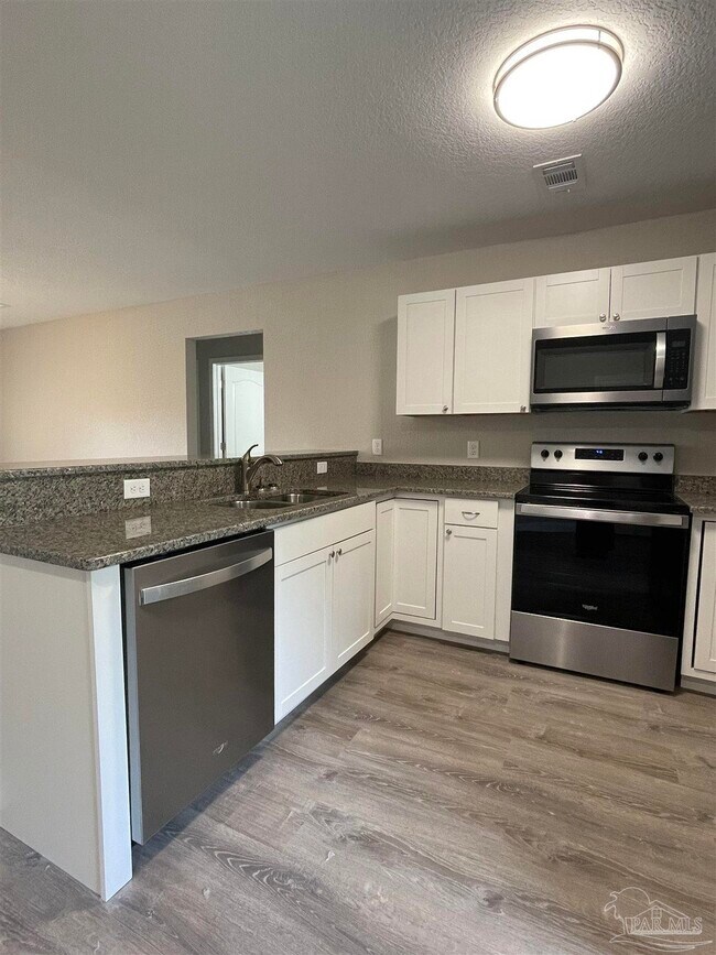 Building Photo - 6868 Branding Iron Ln
