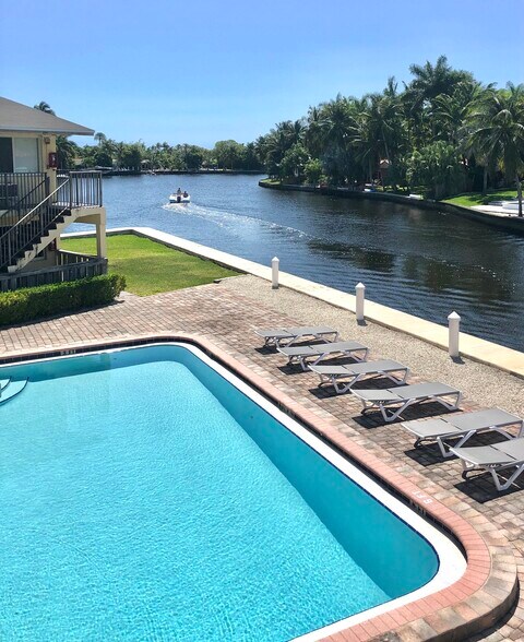 Intracoastal white pebble pool - 1810 E Oakland Park Blvd