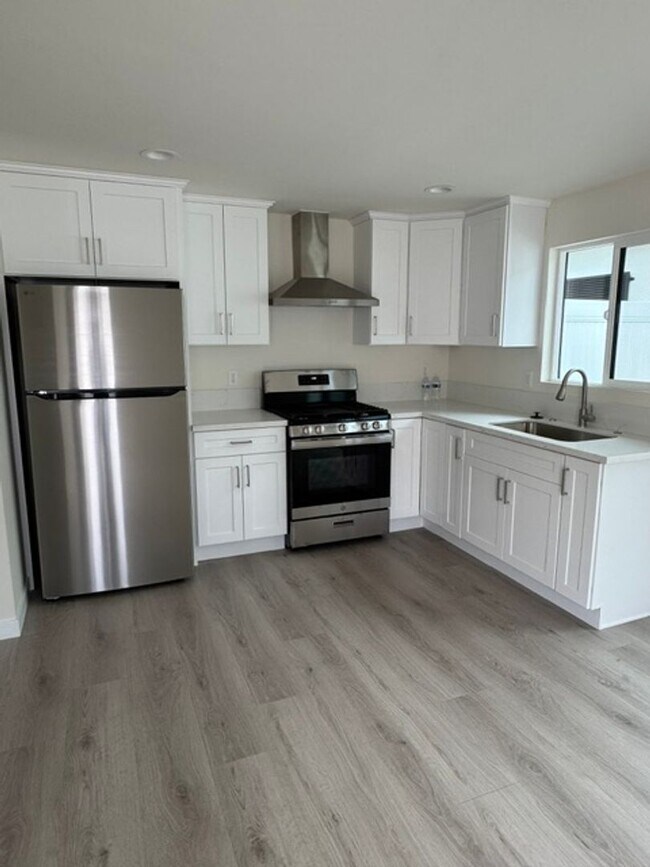 Building Photo - 7317-7321 Garden Grove Avenue