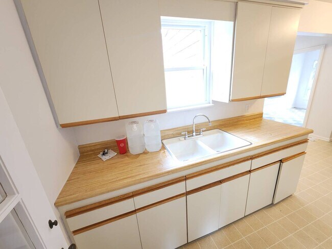 Building Photo - Move-In Special: Save $300 on This Charmin...