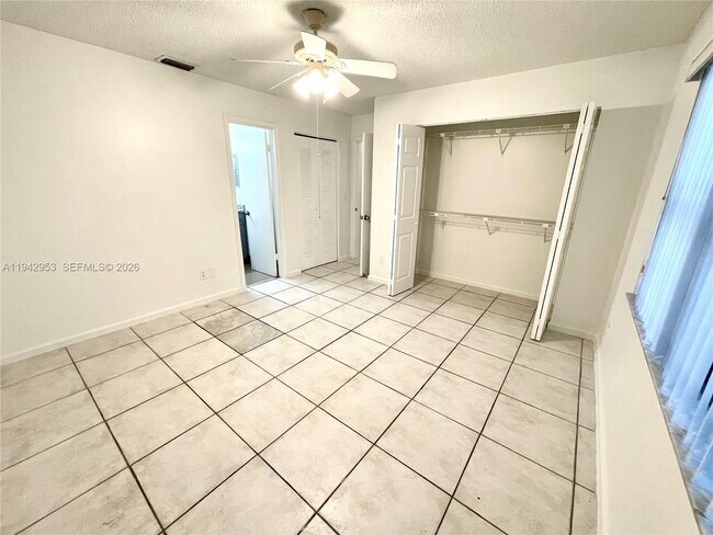 Building Photo - 10992 Royal Palm Blvd