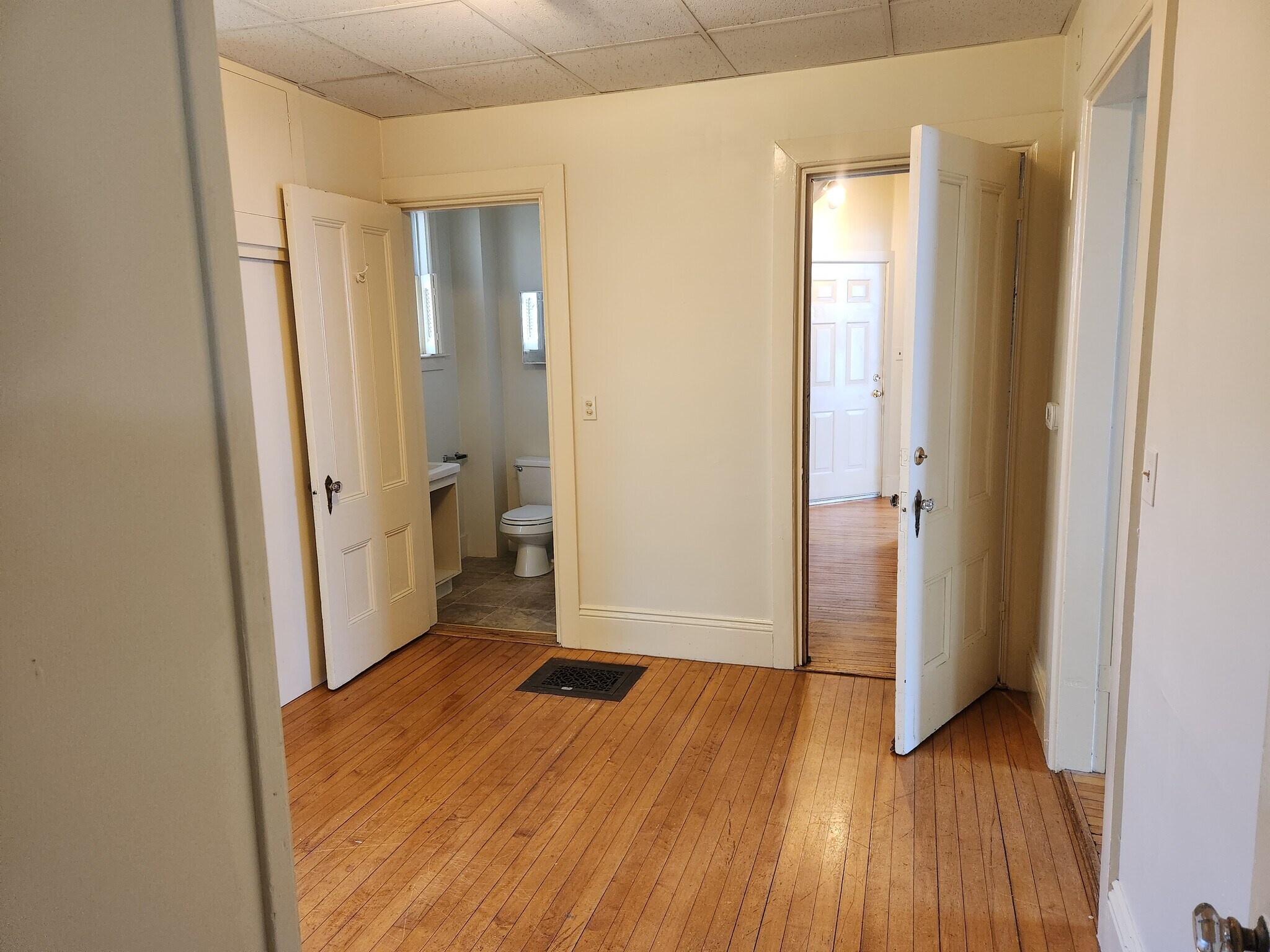 Middle room, good for office, dining room, or living room. Bathroom shown - 46 Saunders St