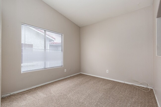 Building Photo - Two bedroom with two car garage in gated c...