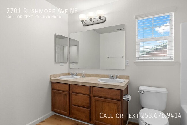 Building Photo - 7701 Rushmore Ave NE