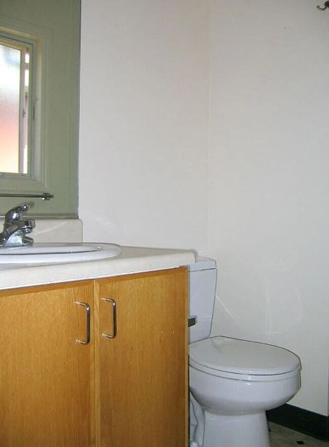 Building Photo - WHAT’S SPECIAL COMFORTABLE SHARED SPACE BRIGHT OPEN-CONCEPT LAYOUT DINING AREA SPACIOUS TOWNHOUSE...