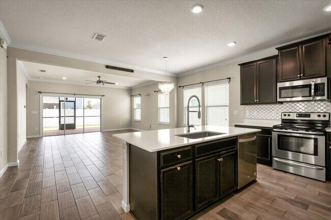Building Photo - Beautiful 3/2 with Fully Fenced Backyard a...