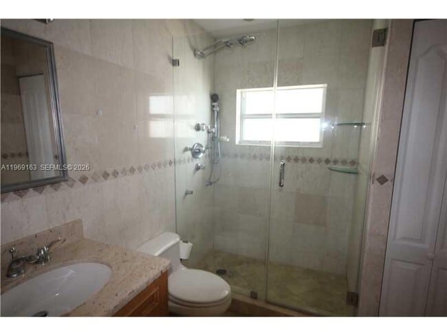 Building Photo - 5401 Collins Ave