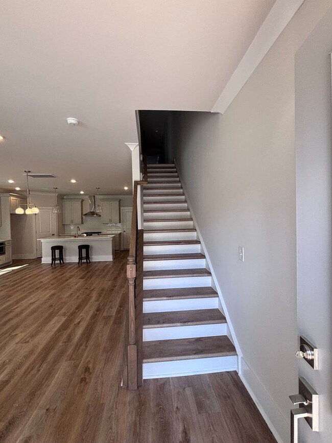 Building Photo - Brand new three-bedroom, 2.5-bath townhome