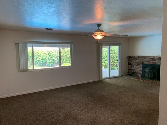 Building Photo - Enjoy the Backyard Pool at This 4-Bedroom ...