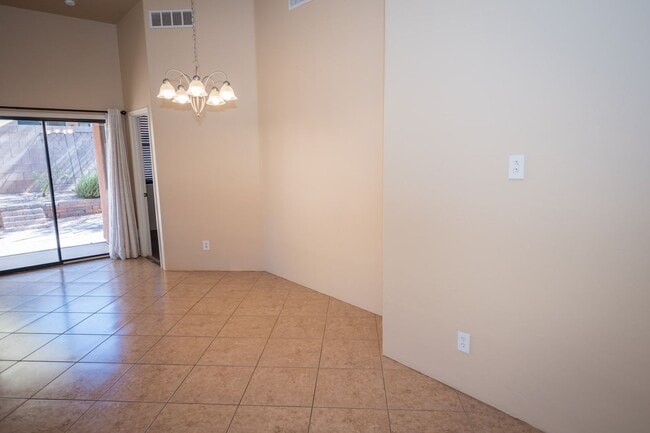 Building Photo - Gorgeous 3 Bedroom 2 Bathroom Home with Tile Throughout! Central A/C, 2 Car Garage!