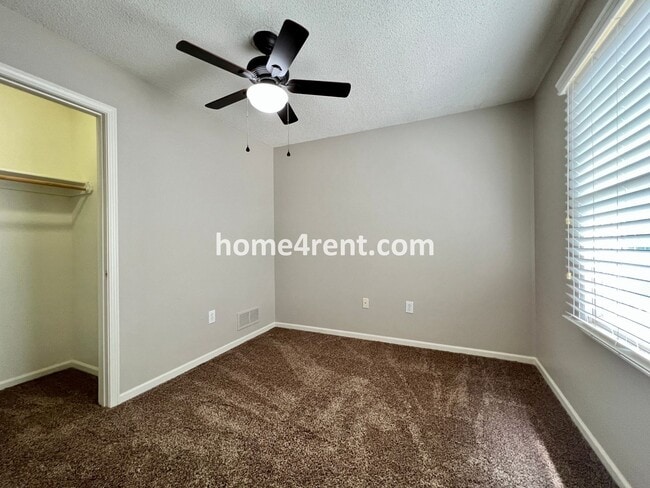 Building Photo - Updated Kitchen, Large Two Tiered Deck, Finished Basement in Blue Valley Schools!