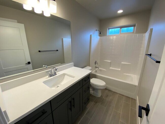 Building Photo - Beautifully Designed 3 Bedroom Townhome Ne...
