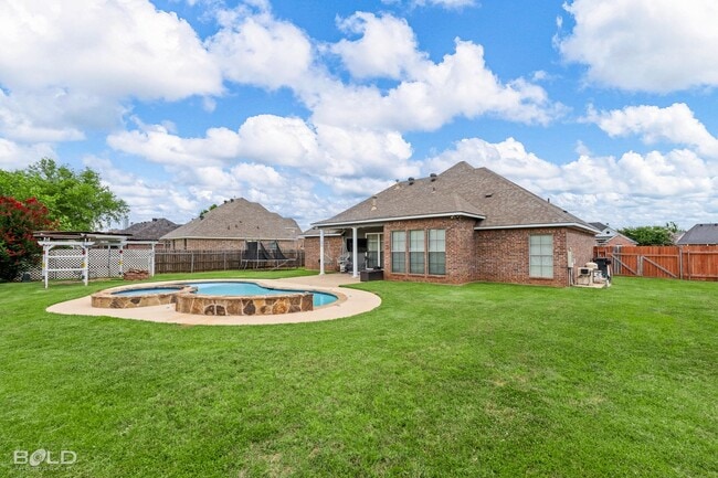 Building Photo - Check Out this 4 Bed 2 Bath with A Pool an...