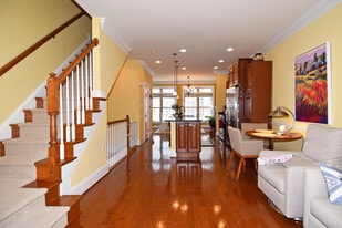 Open kitchen and living room (paint has been updated) - 451 N George Mason Dr